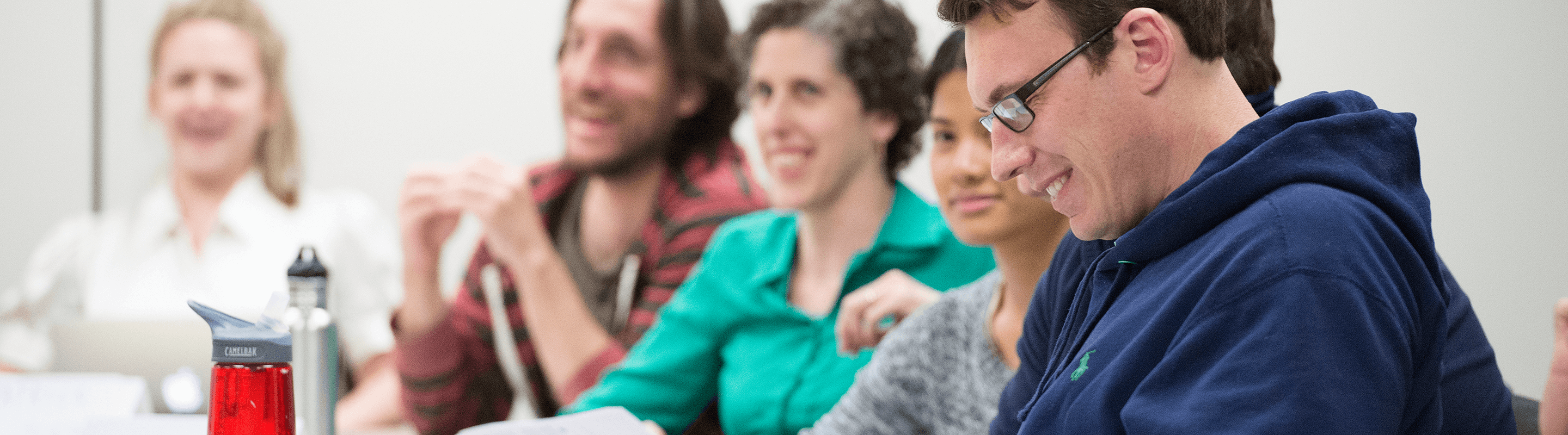 Group of smiling adult students