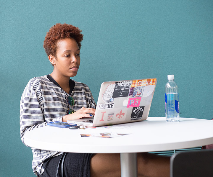 Girl looking at laptop screen