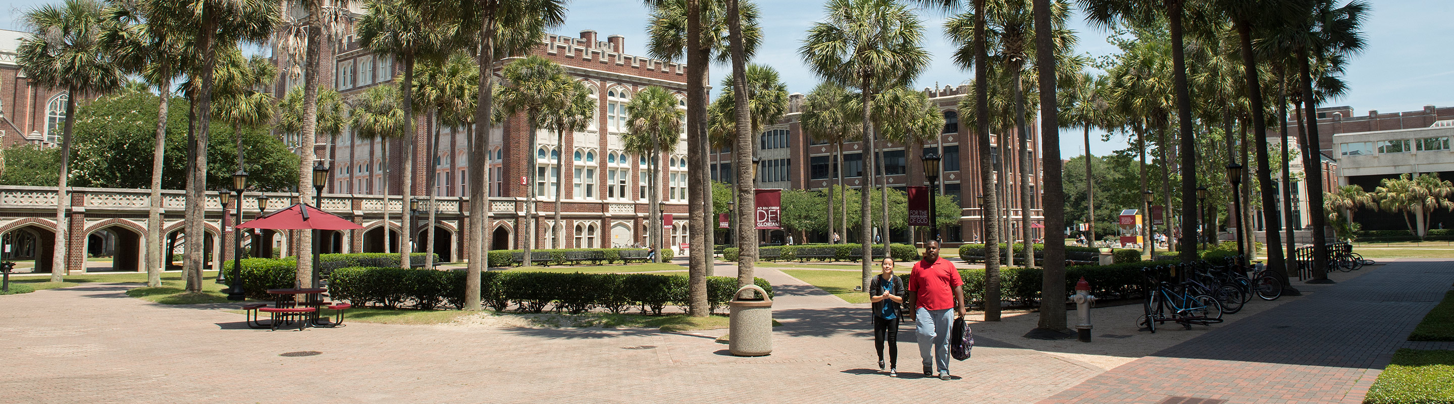 Students walking through Palm Court