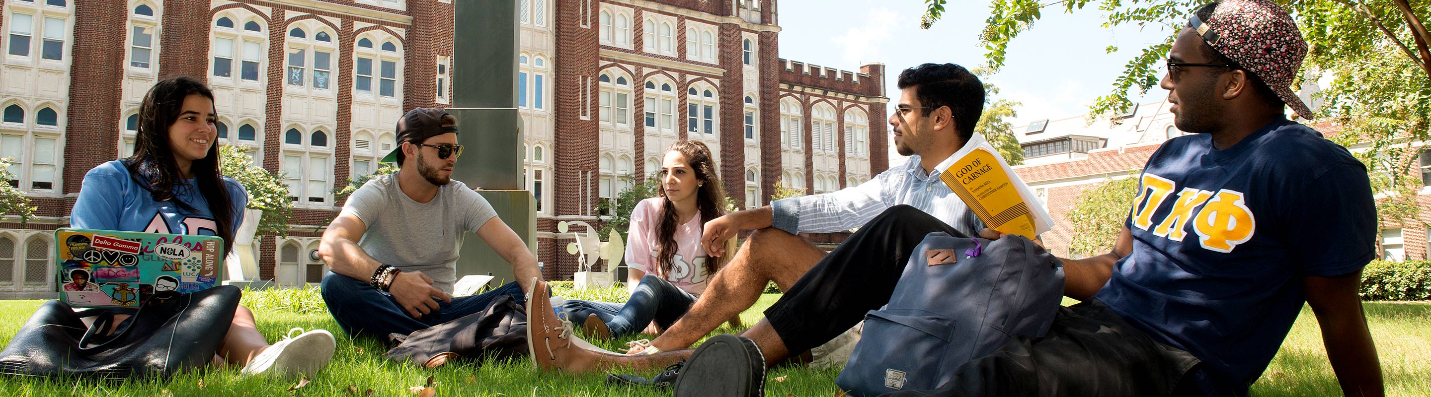 First-year students on lawn discussing