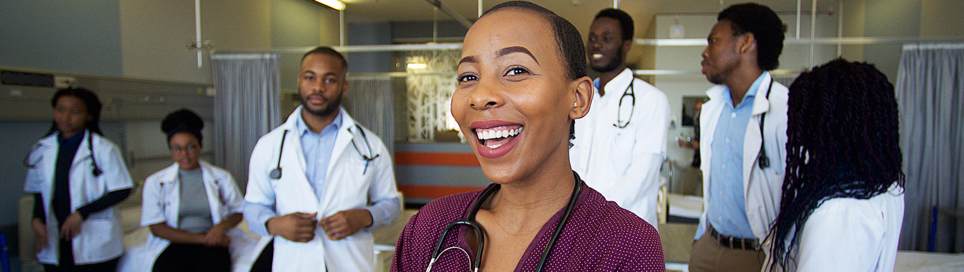 Online MSN students standing in a semi circle.