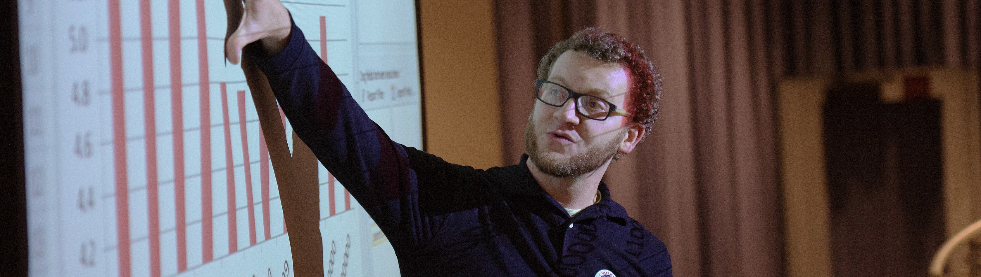 Online MBA student presenting to his class.