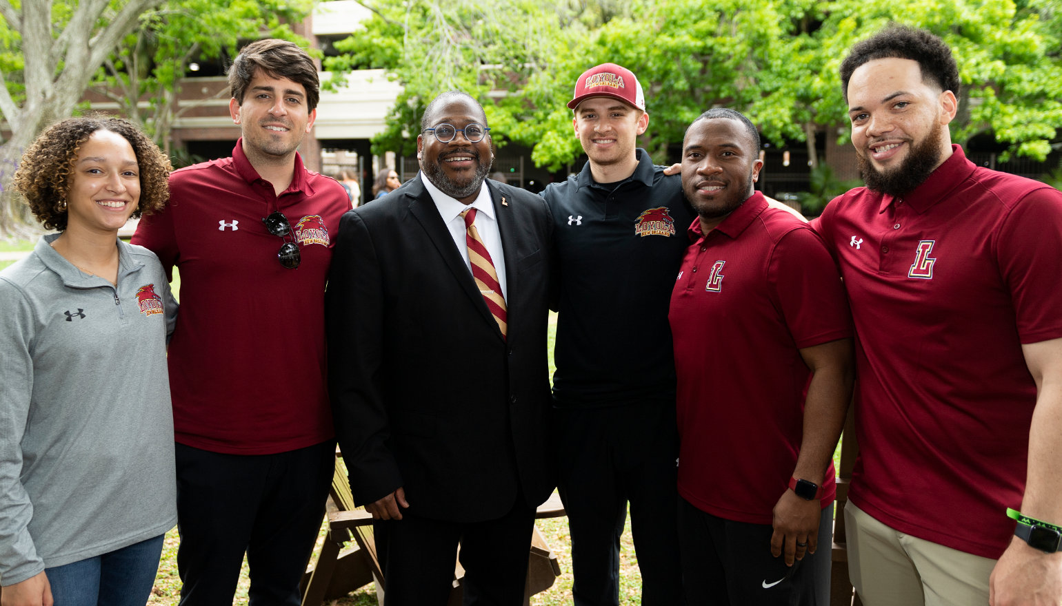 Xavier Cole mingles with staff and students on the Peace Quad.