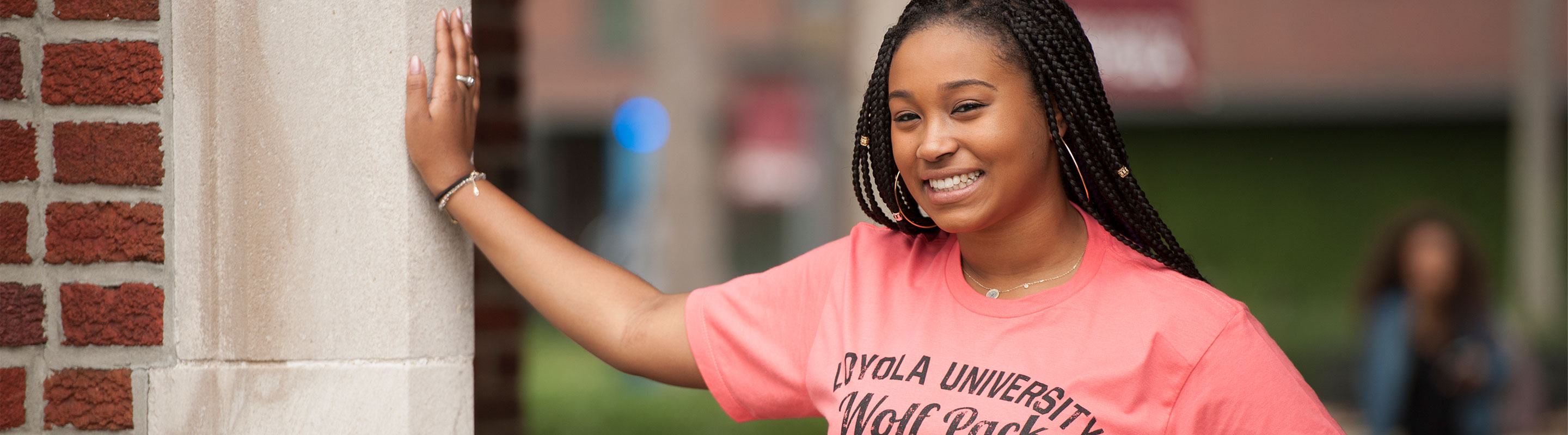 Loyola Student Smiling Outside